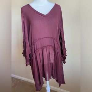 Free People sheer burgundy flowy top with split ruffled sleeves.  Medium